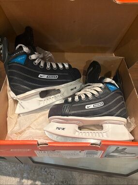 Bauer Youth Hockey Skates in Black and White with Blue Accents